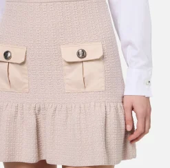 Gonne|Elisabetta Franchi Minigonna in lana bouclé con tasche in vela tecnica Lattice